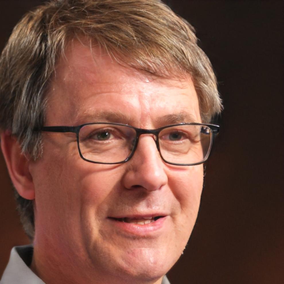 Portrait de Lucien Beaumont, formateur en finances personnelles